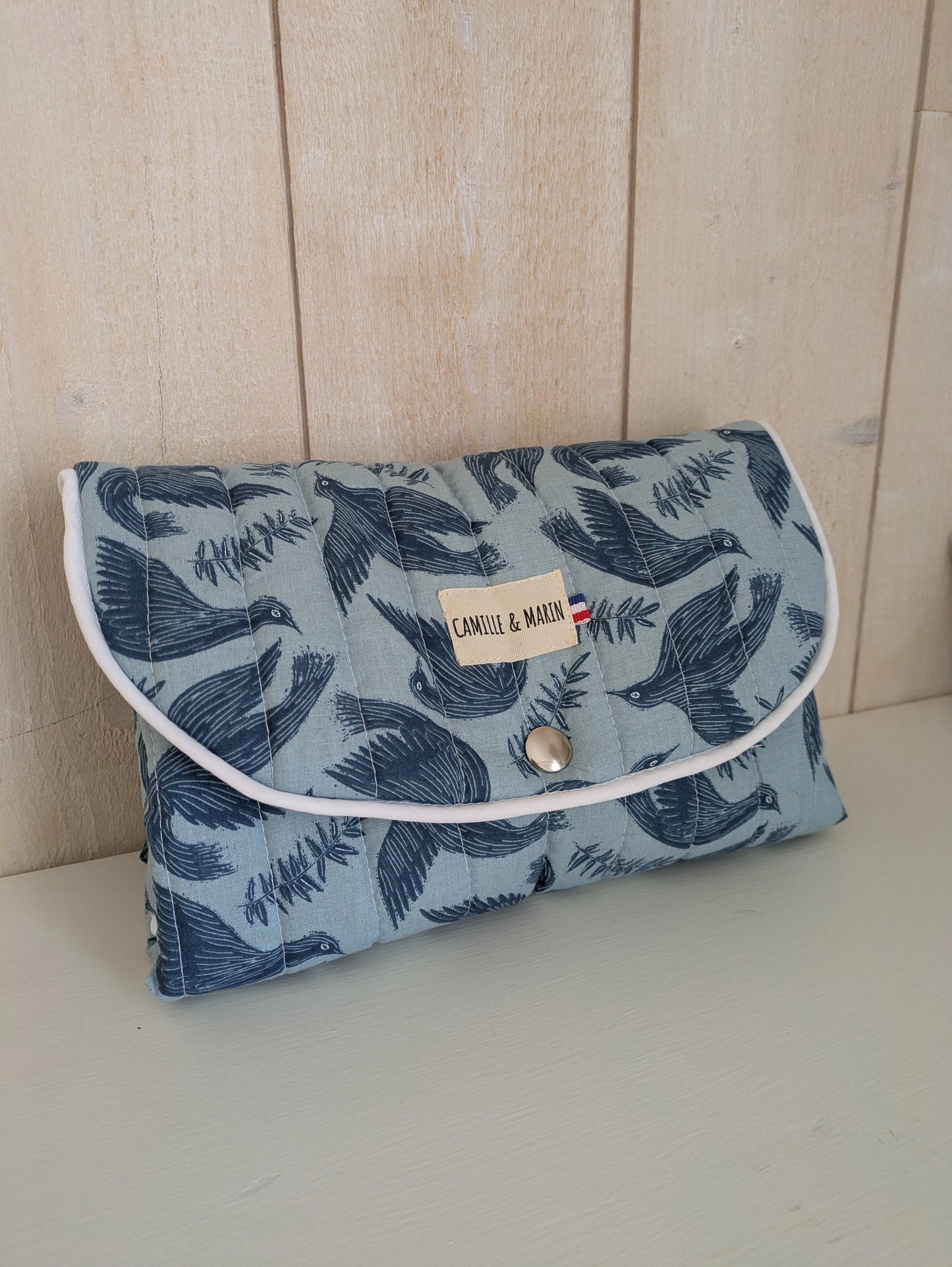 tapis à langer nomade oiseau bleu